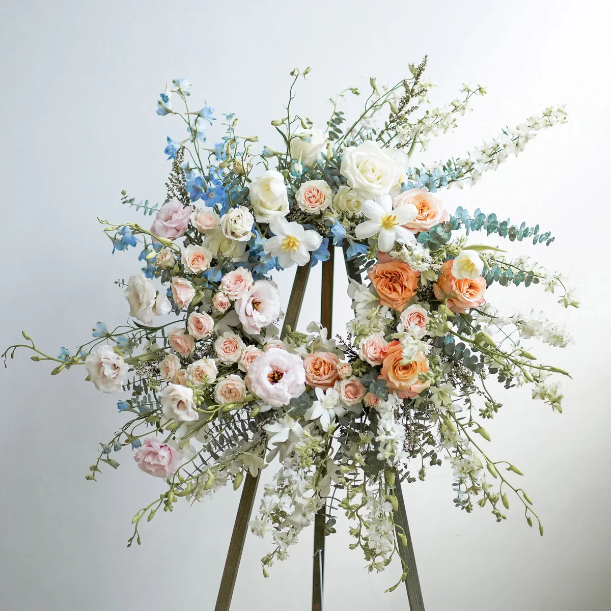 funeral-flower-wreath-1200x1200.webp