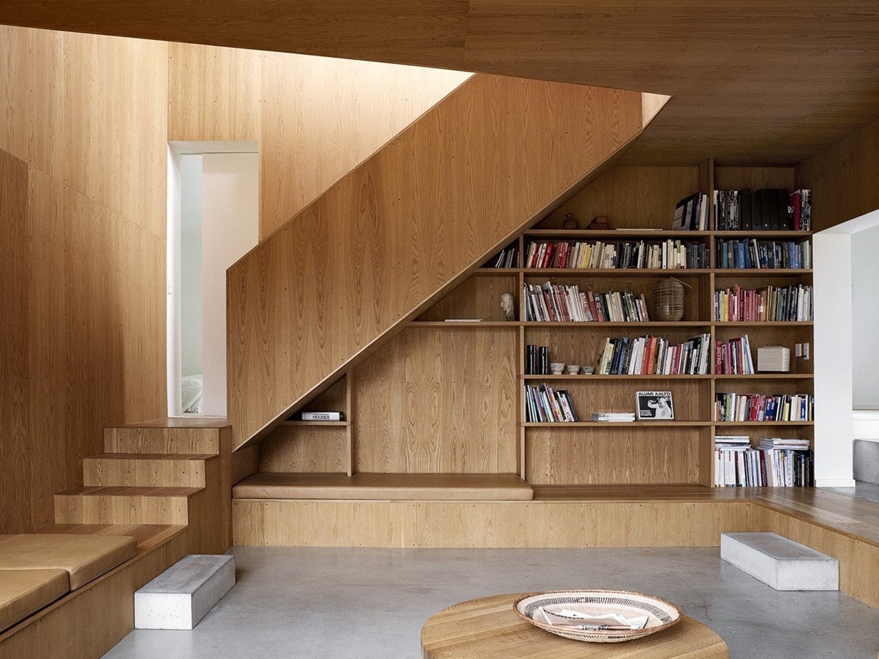 wood-paneled-bookshelf-staircase.jpg