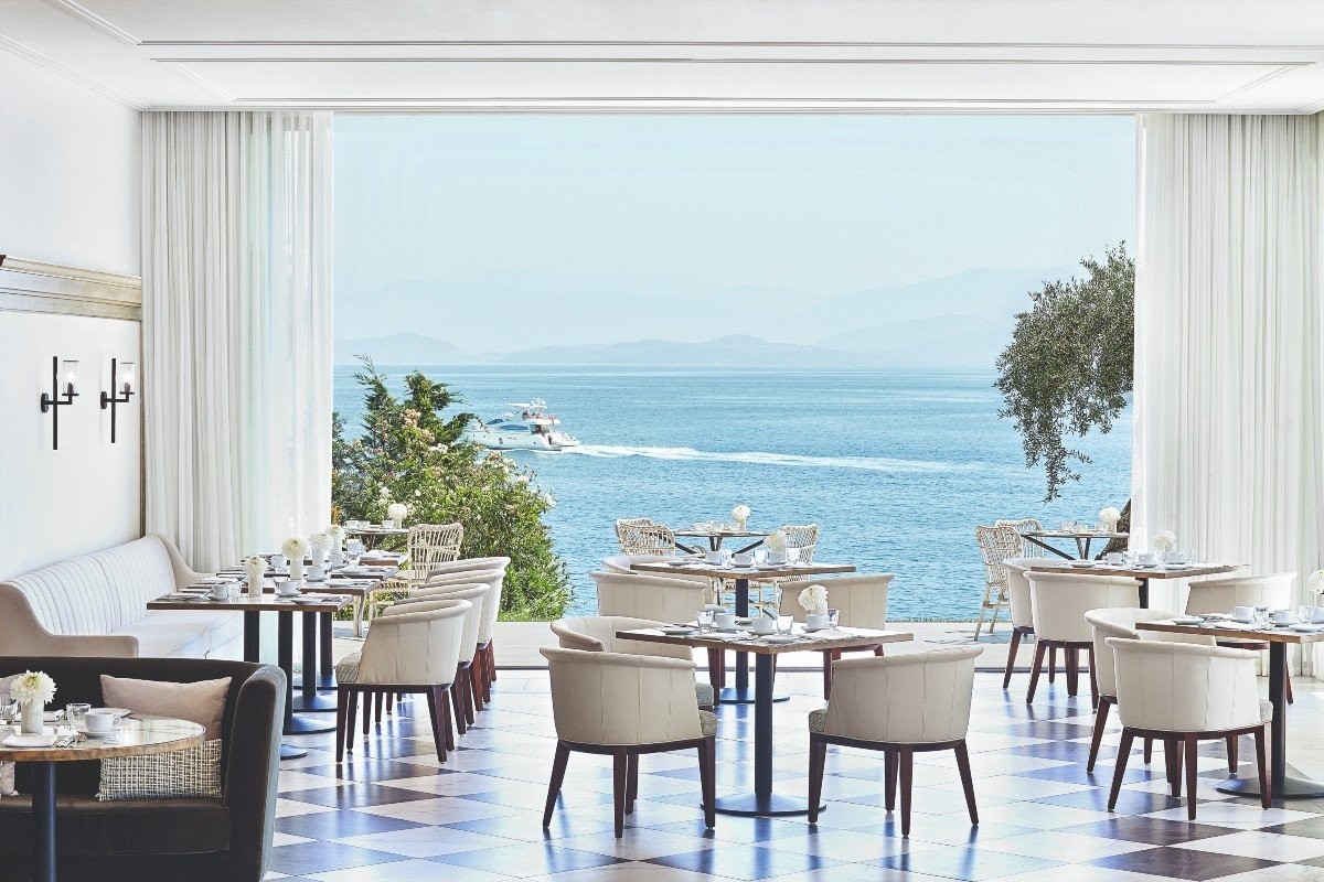 20-move-out-to-the-lush-patio-of-mon-repos-to-enjoy-the-expansive-views-of-the-ionian-sea.jpg