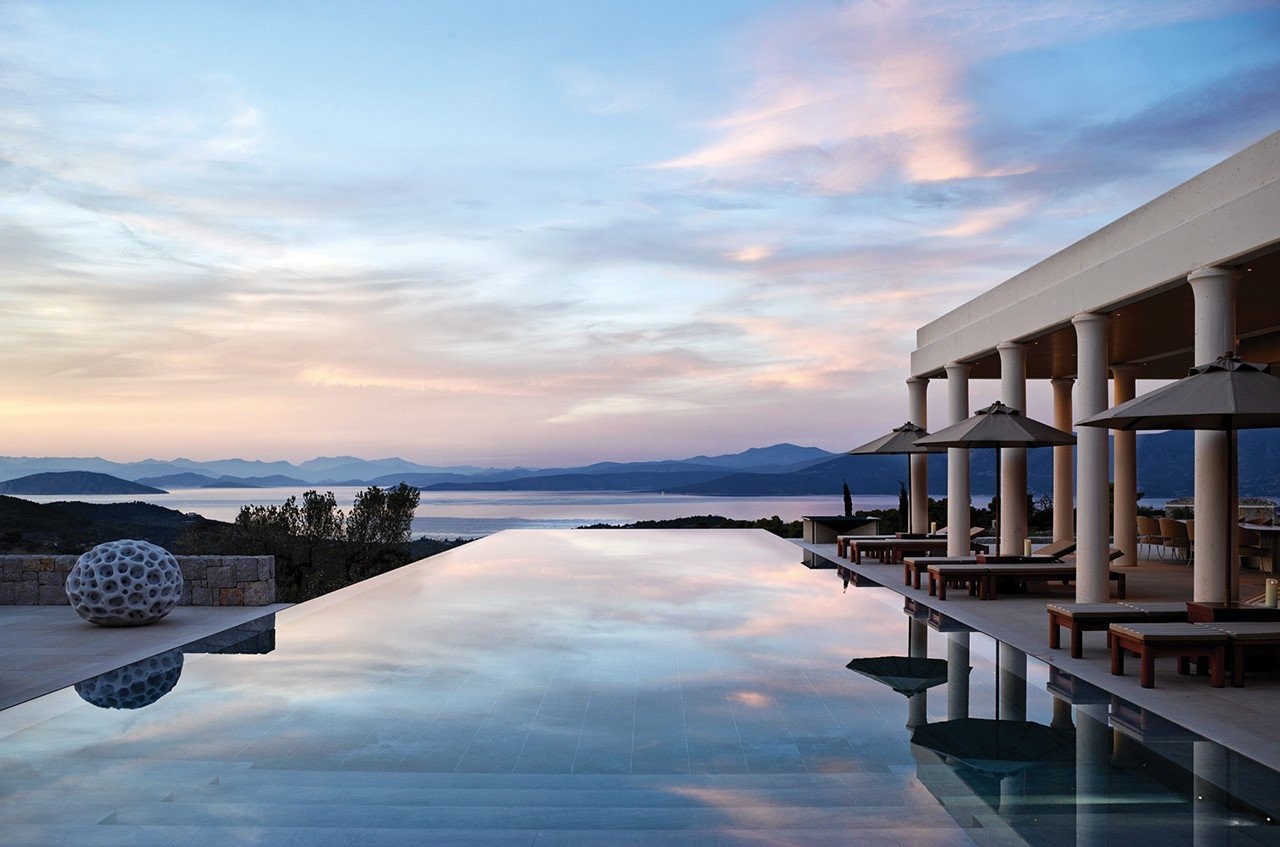 amanzoe-greece-accommodation-villas-villa-20-swimming-pool-view-sunset-7484.jpg