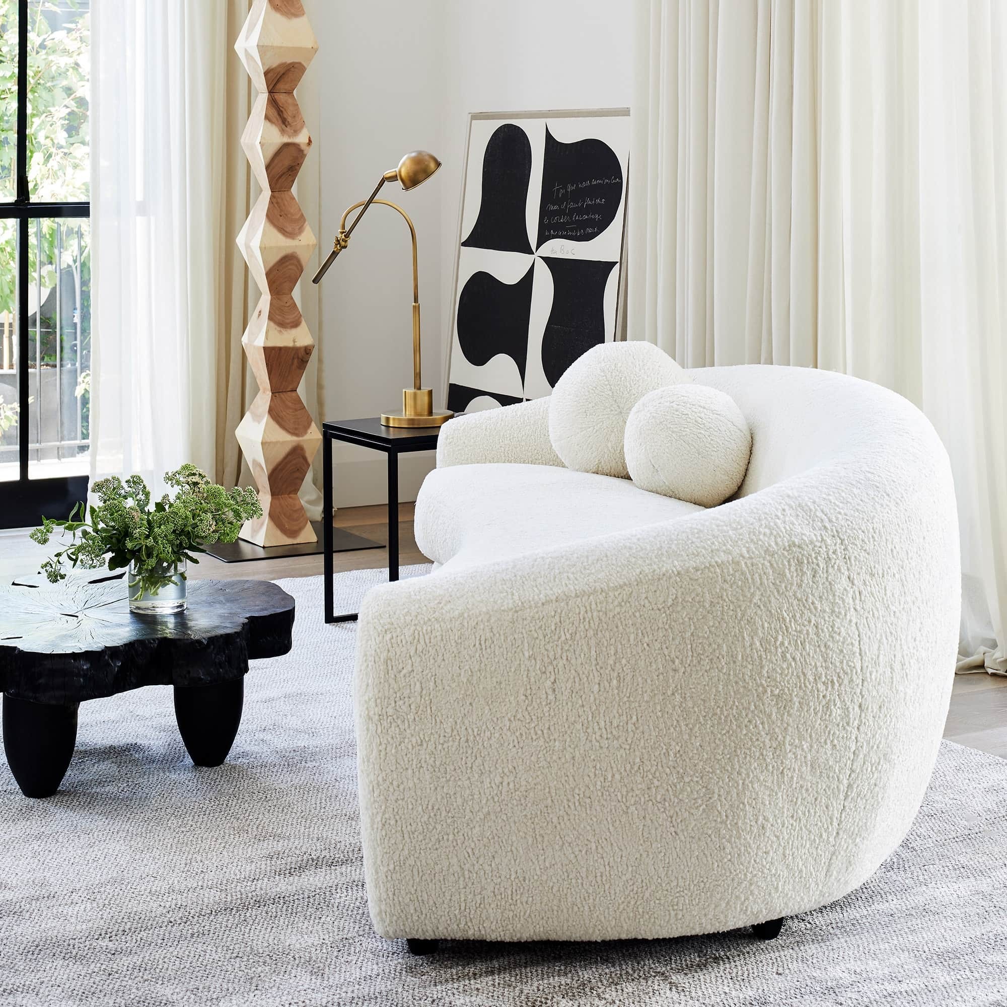 coco-republic-white-boucle-sofa-in-luxe-living-room.jpg