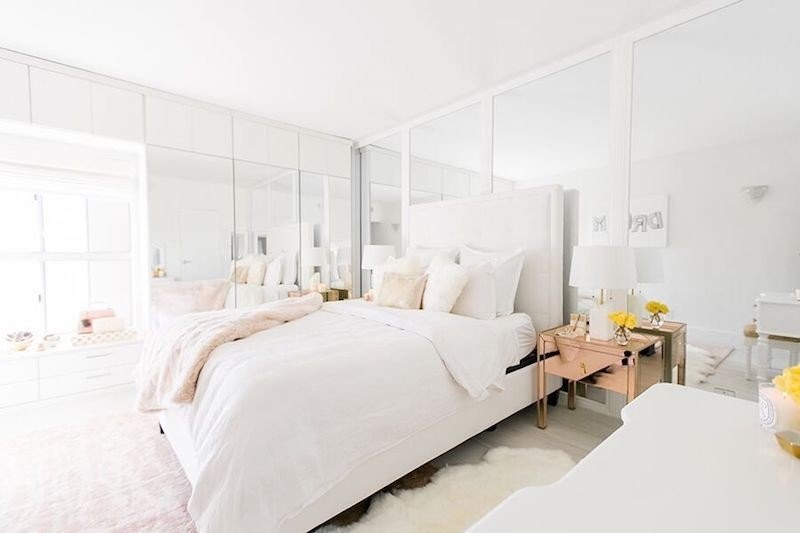 white-bedroom-with-rose-gold-metallic-nightstand-via-sydne-summer.jpg