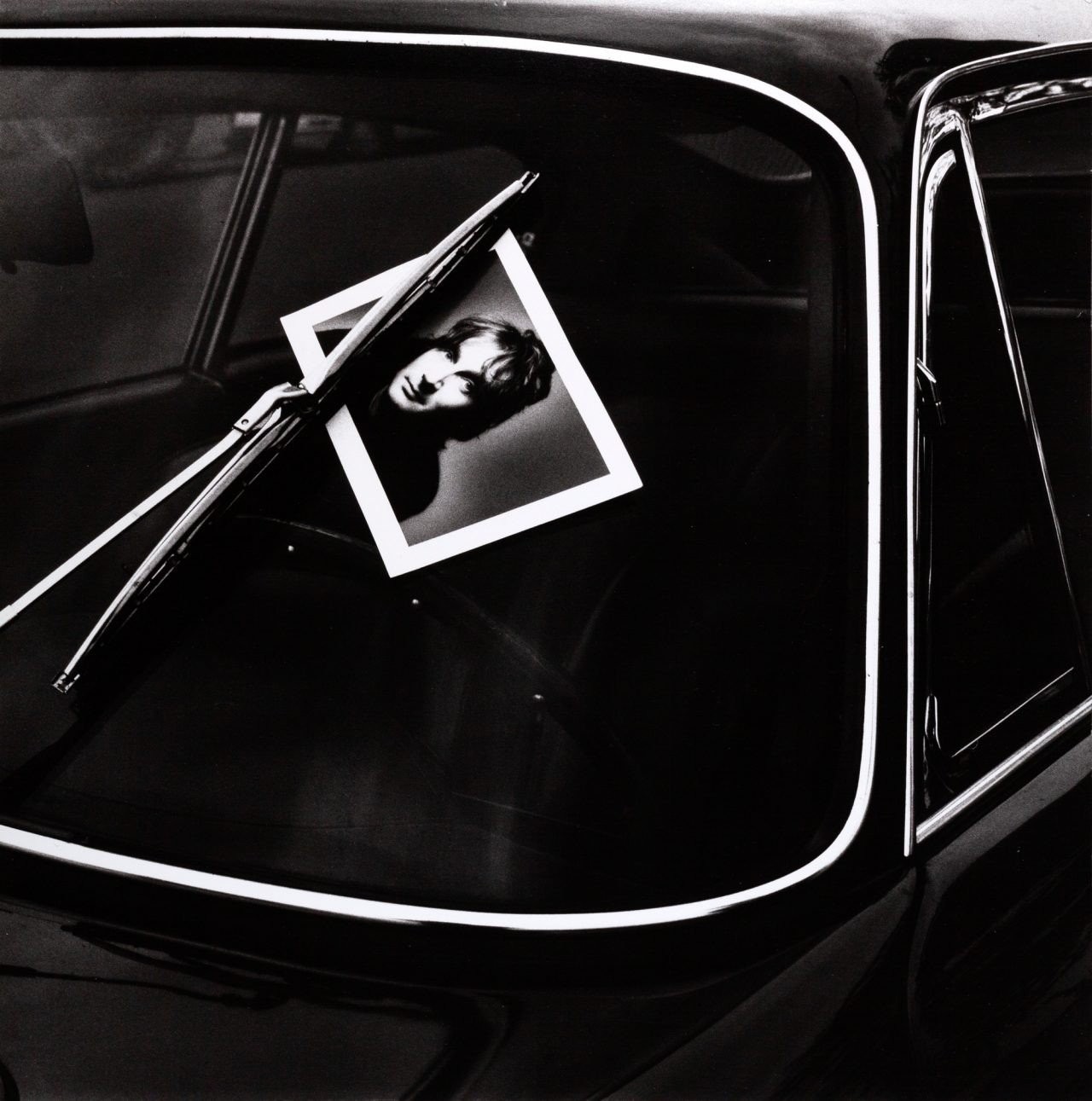 12-jeanloup-sieff-self-portrait-on-car-1977-polaroid-t665-copyright-jeanloup-sieff-1280x1291.jpg