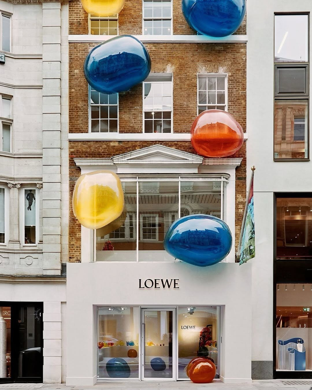 at-loewe-perfumes-inflates-a-series-of-bold-colorful-bubble-sculptures-across-its-mayfair-storef.jpg