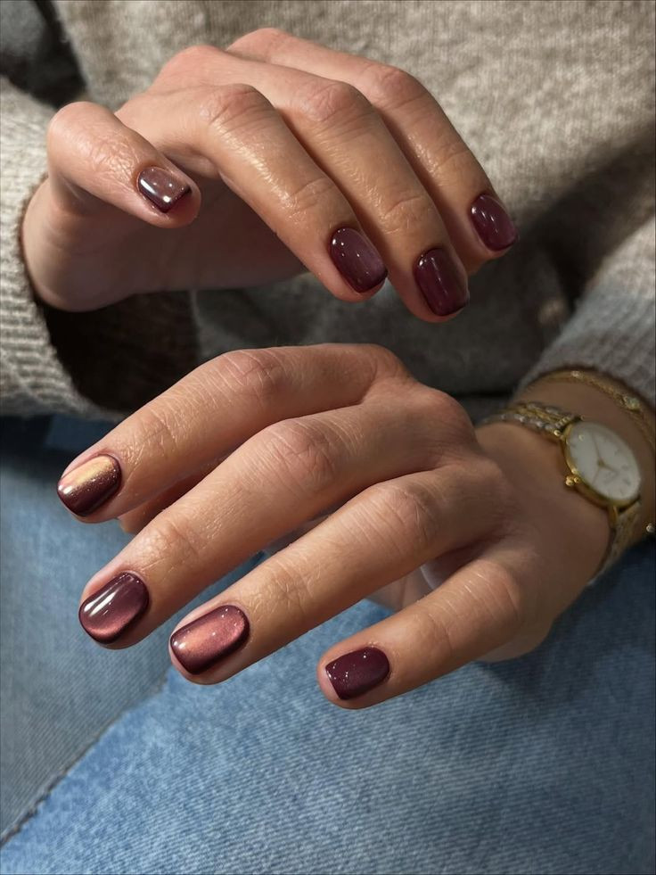 burgundy-cat-eye-nails-magnetic-glow-manicure.jpg