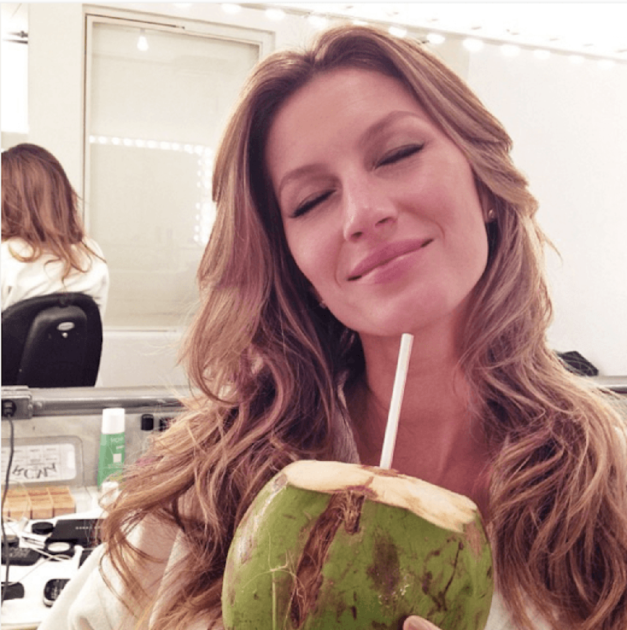 gisele-drinking-coconut.png