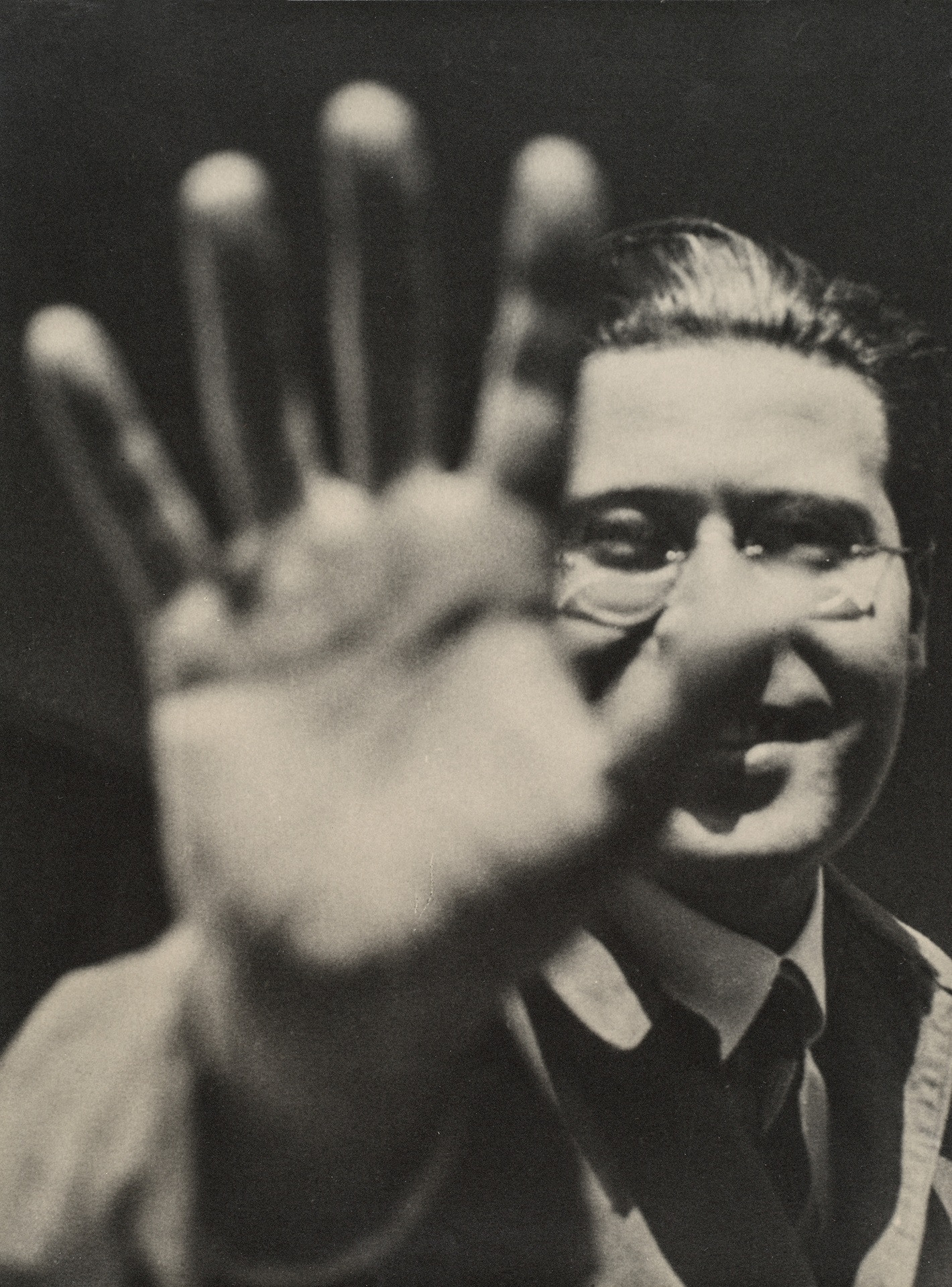 4-photograph-self-portrait-with-hand-c-1925-1929-cestate-of-the-laszlo-moholy-nagy.jpg