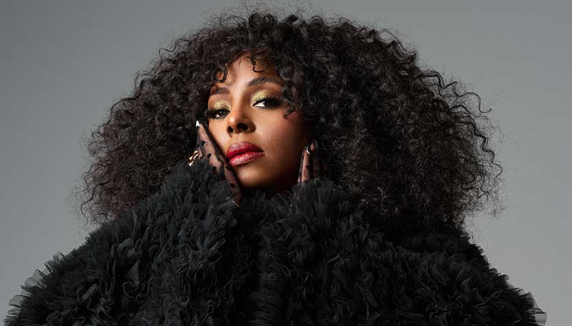 ledisi-wearing-a-large-black-coat.jpg