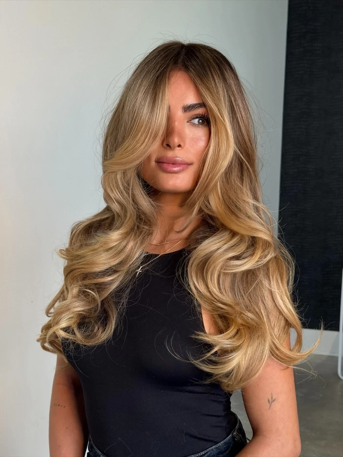 11-golden-honey-blonde-butterfly-layers-honey-blonde-hair-color-1400xprogressive.webp