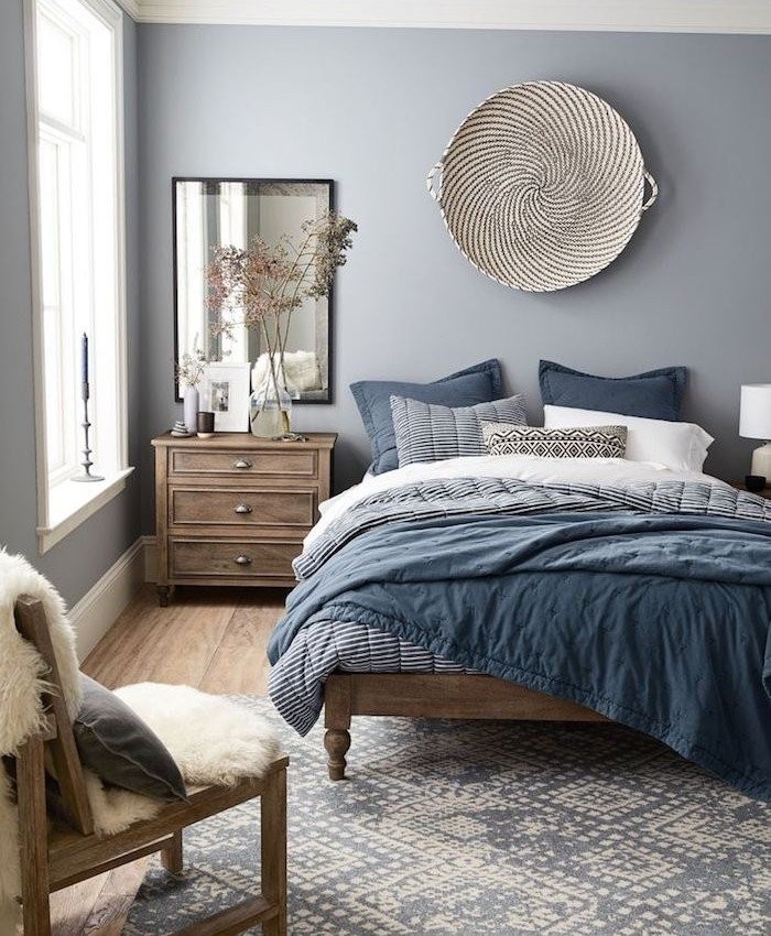 nordic-blue-and-grey-bedroom-with-wooden-bed-and-furniture-and-blue-and-white-bed-covers-cozy-nordic-look.jpg