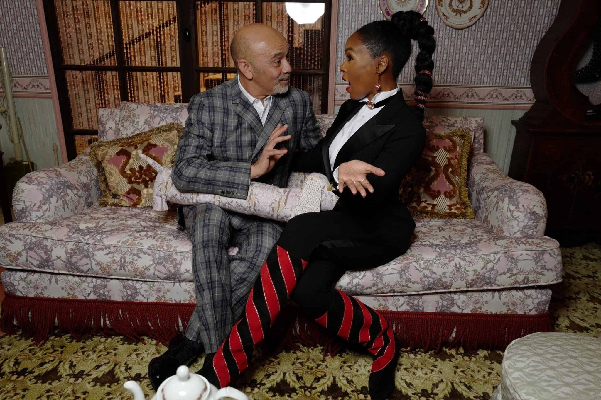 janelle-monae-and-christian-louboutin-at-the-opening-of-lexhibitionniste-c-stephane-feugere-1-scaled.jpg
