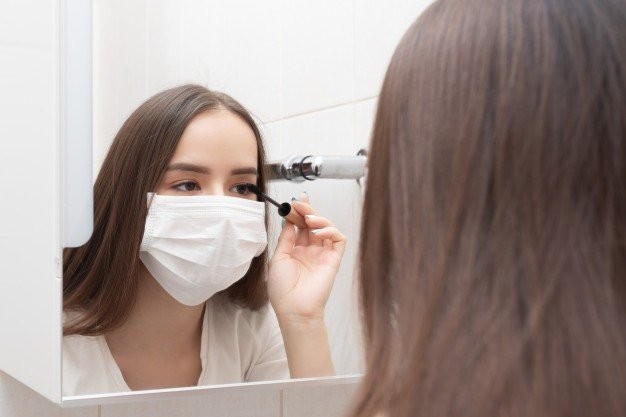 life-quarantine-coronovirus-woman-medical-mask-does-makeup-mascaras-her-eyes-disease-prevention-protection-165545-154.jpg