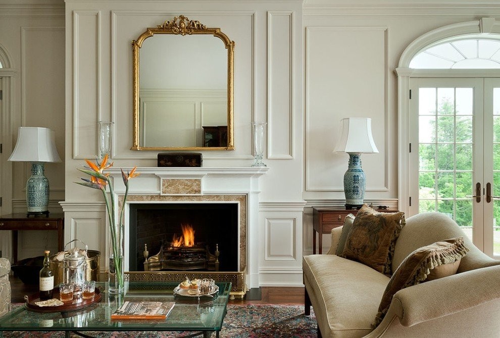 mirror-over-fireplace-family-room-traditional-with-tools.jpg