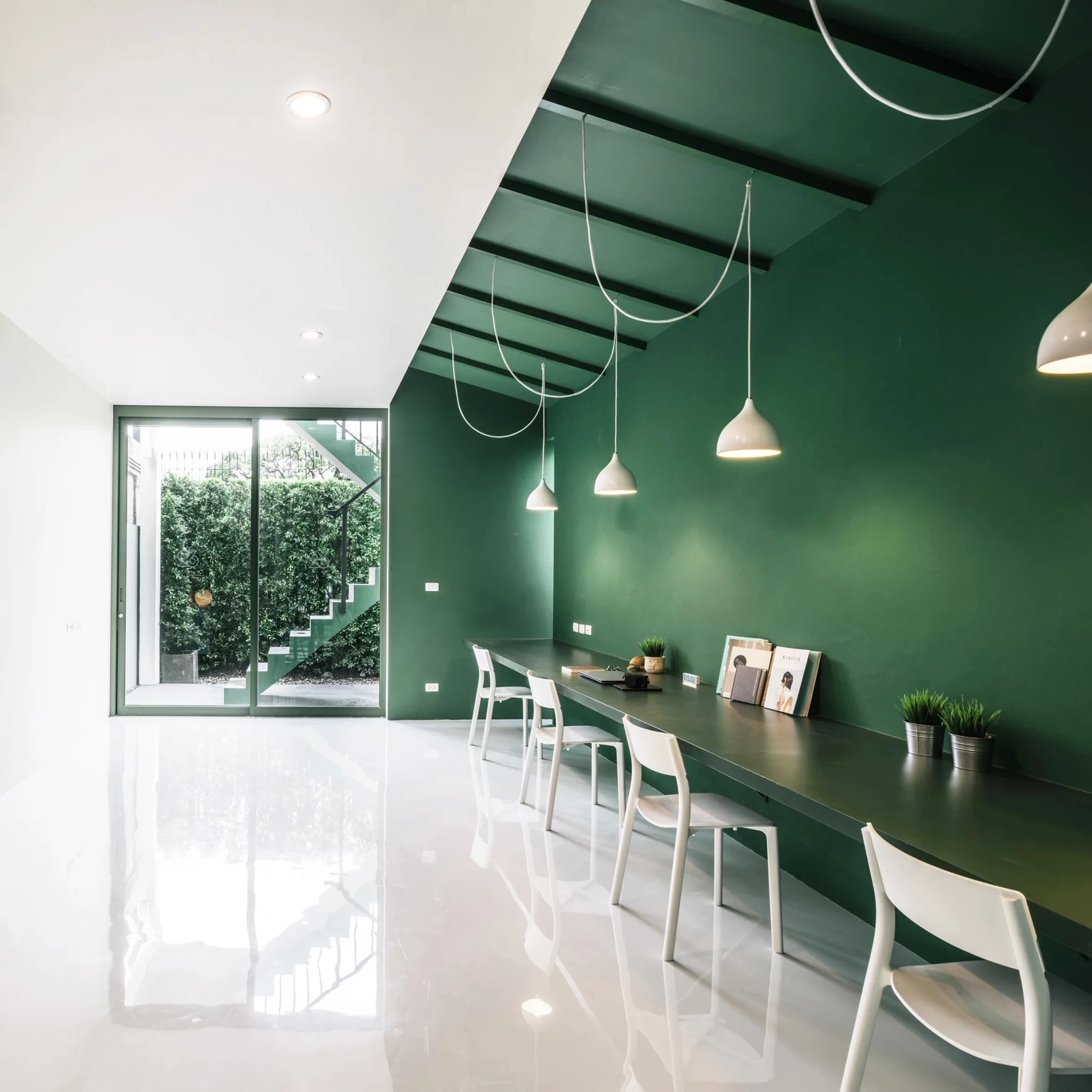 green-26-anonymstudio-workspace-lounge-minimalist-offices-roundup-dezeen-sq.webp
